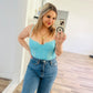 Out from under blue corset