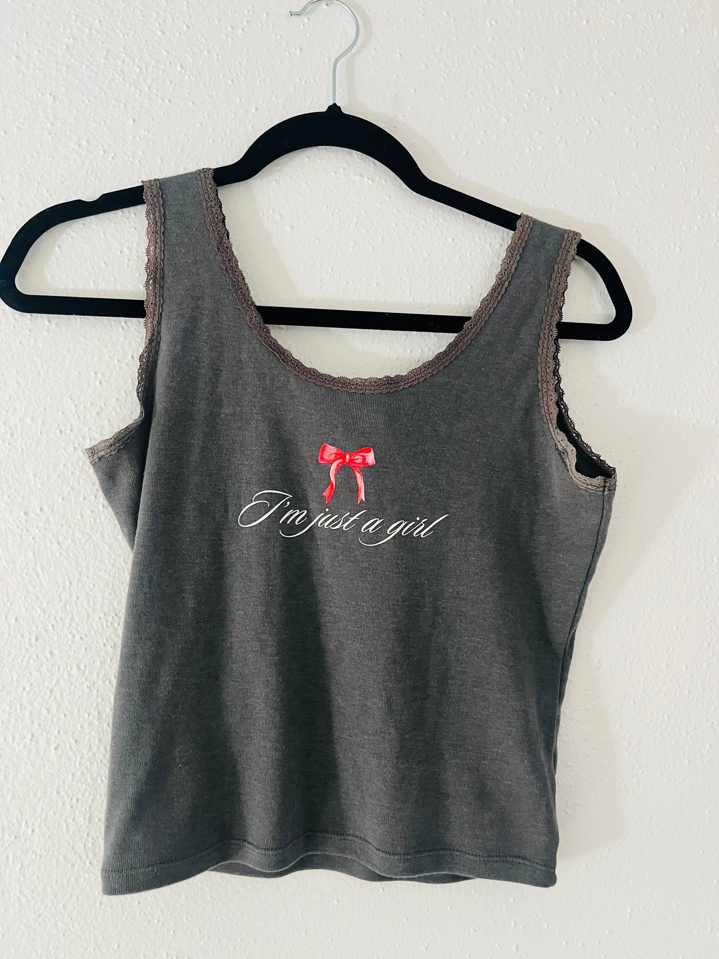 I’m just a girl tank top