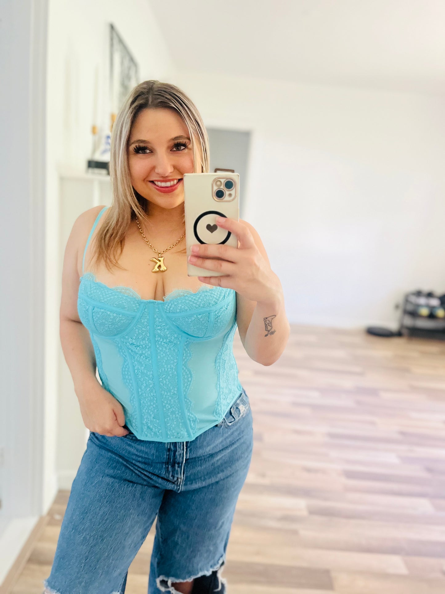 Out from under blue corset