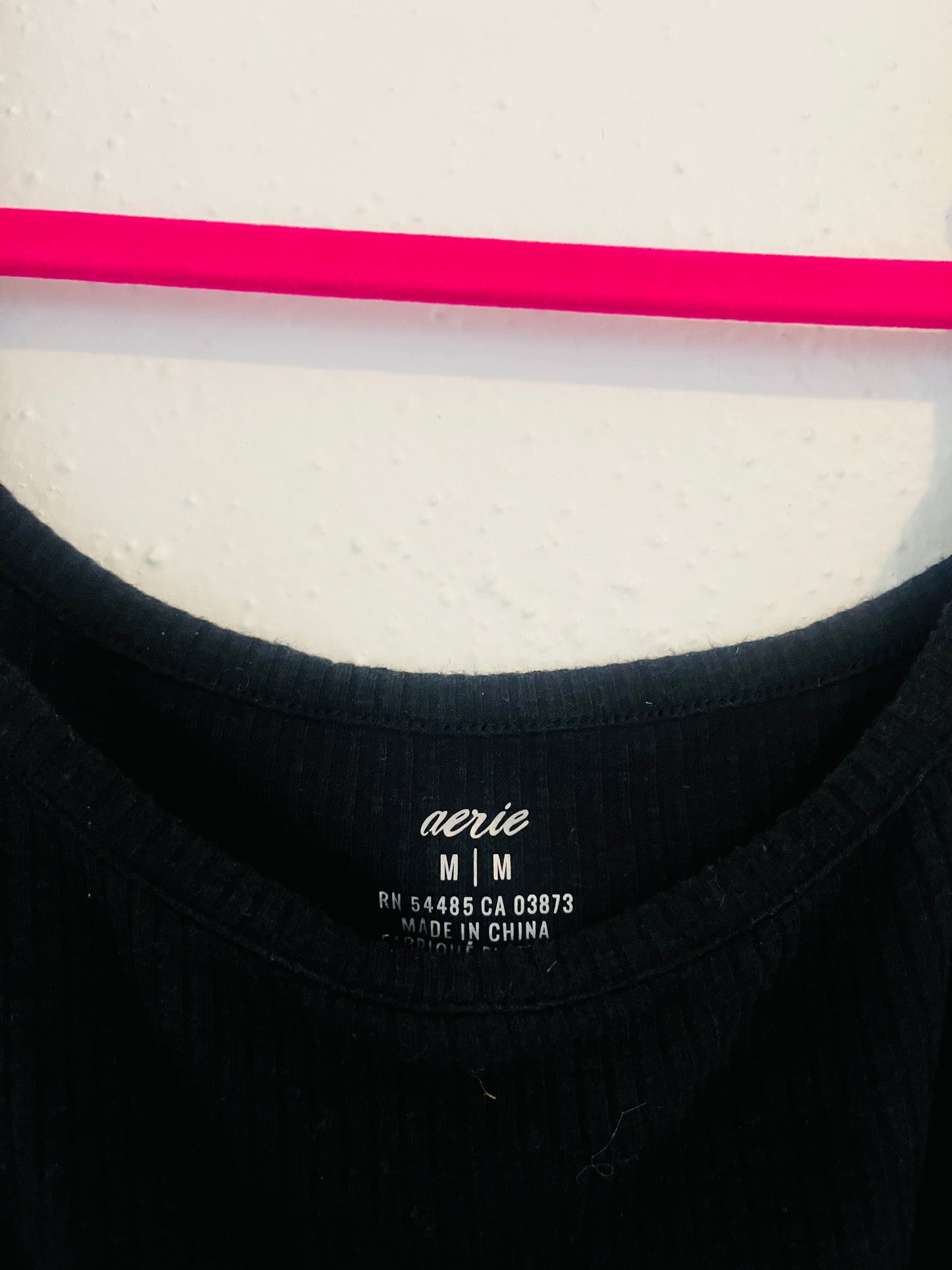 Arie black tank top