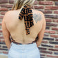 Kayla’s halter bodysuit